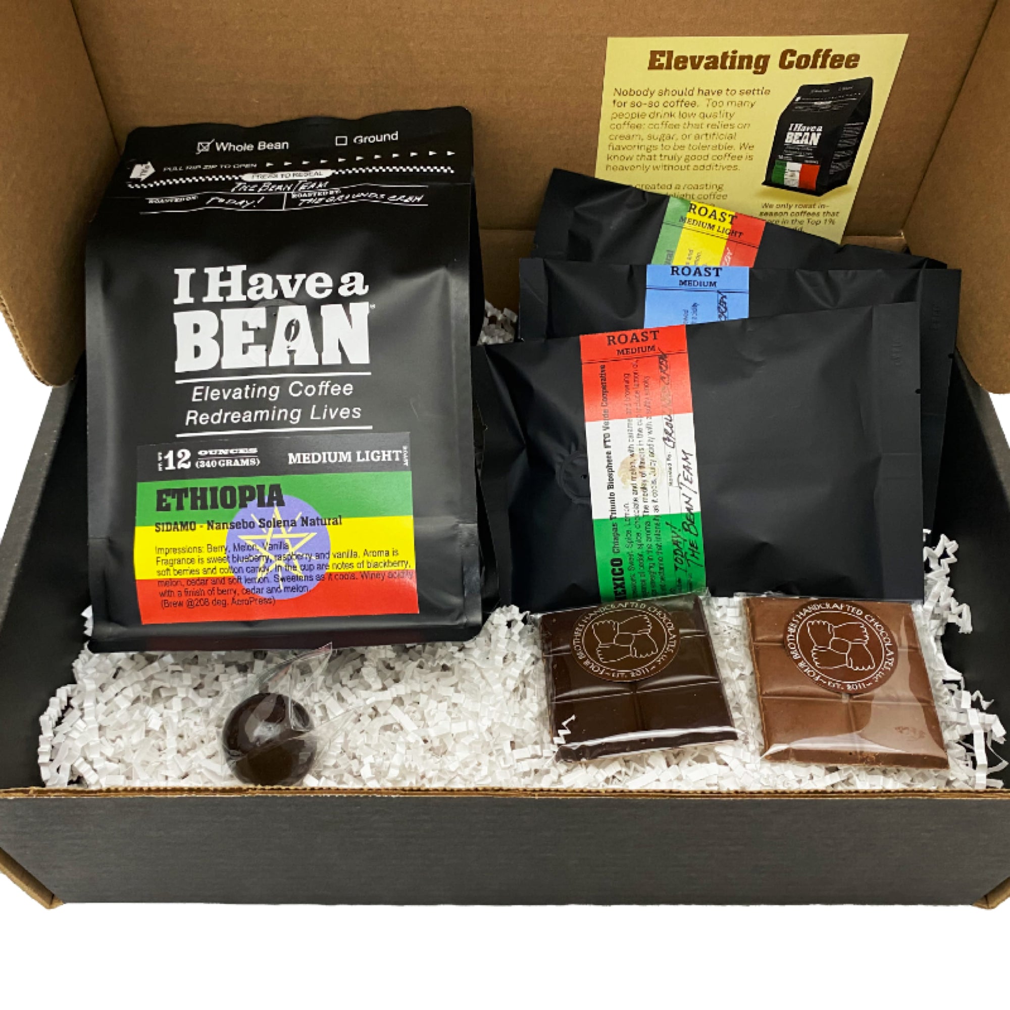 Inside of the Apprentices Gift Box with coffee samples and chocolate