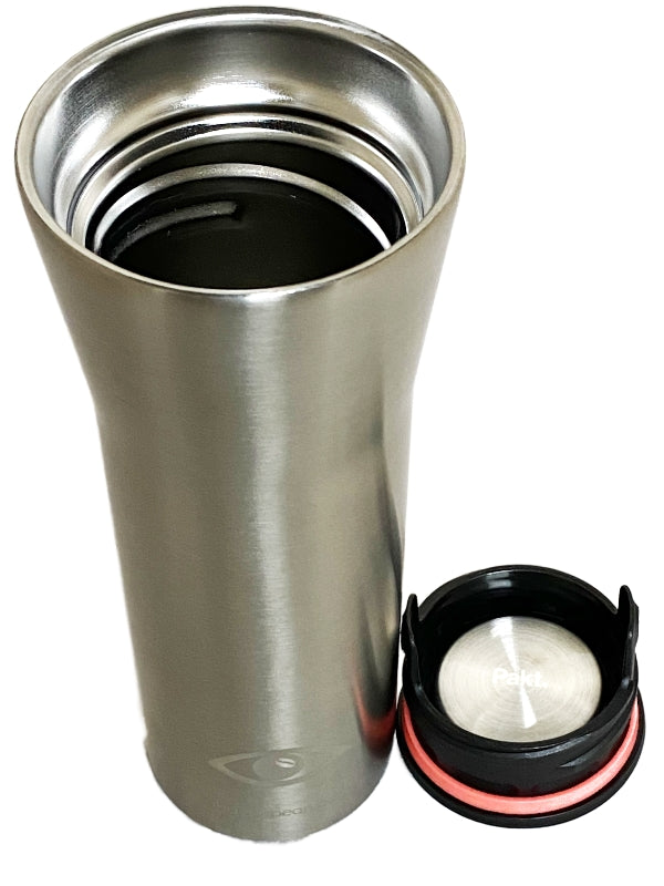 Angled side view of the Pakt tumbler showing its sleek, silver body and black lid